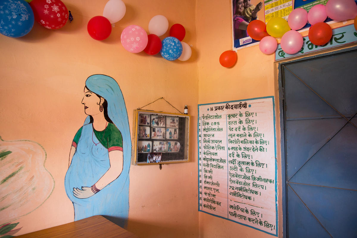 A painting of a pregnant woman adorns the walls of a health center in Semli Jadid Village, Sehore District, Madhya Pradesh, India on September 25, 2018- PMMVY