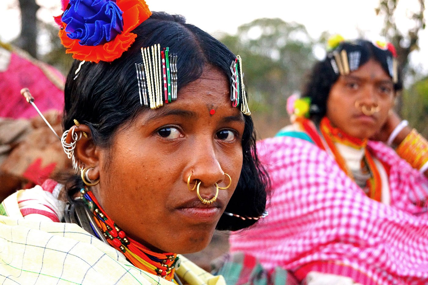 Closeup of an adivasi woman with her traditional jewellery