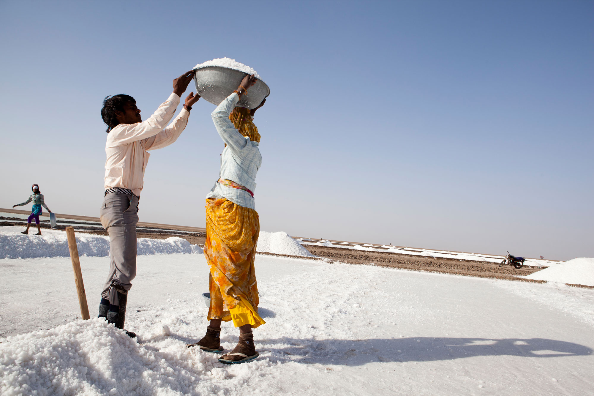 Men carrying snow