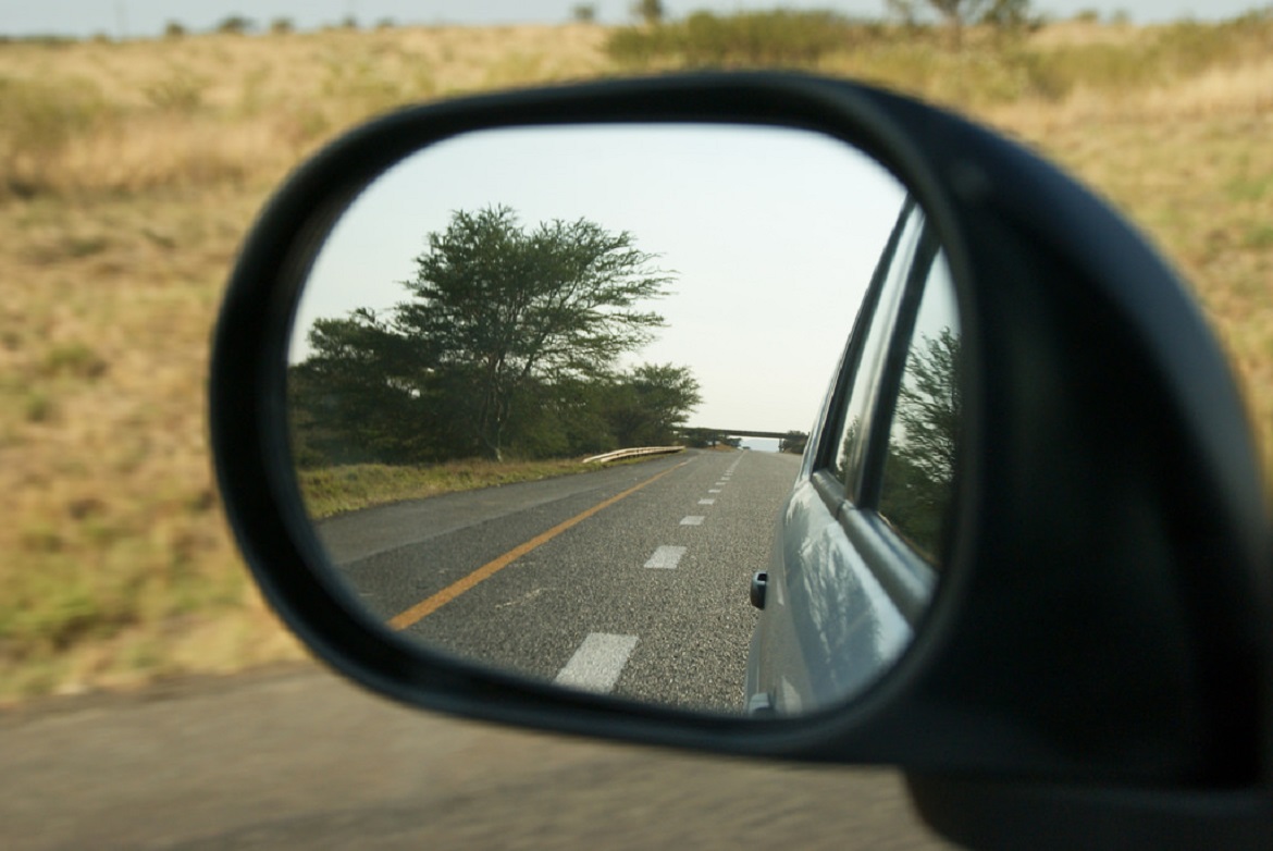 the road in a rearview mirror