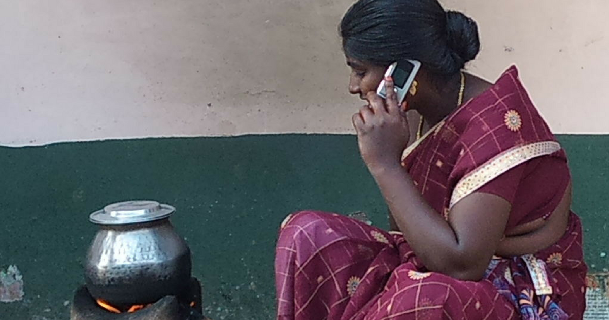 Village woman talking on the phone