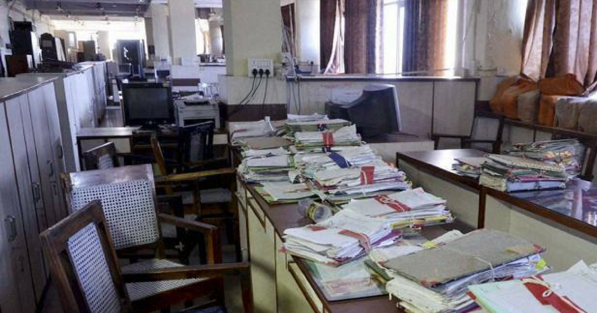 government office with stacks of files