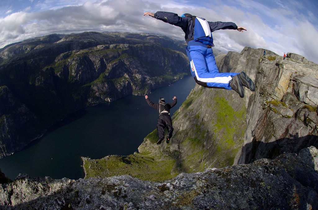 two skydivers jumping off a cliff-risk management_Wikimedia commons_philanthropy