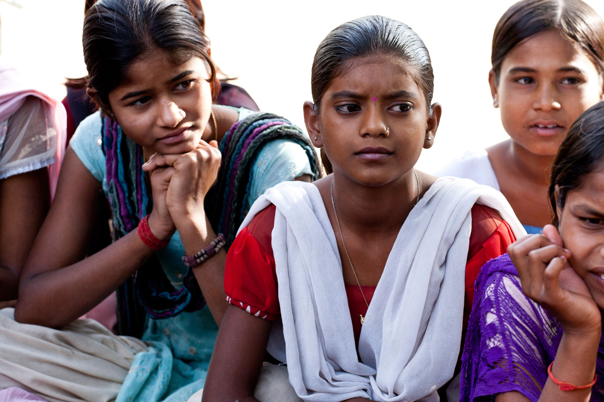 Young Indian girls sitting together