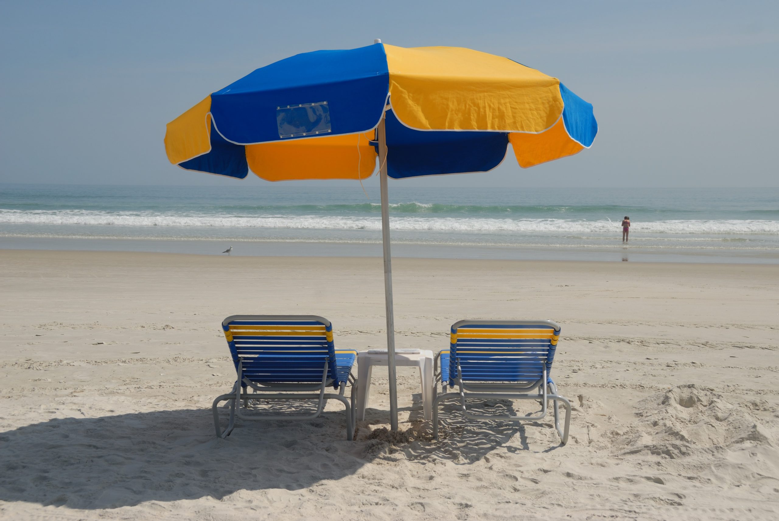 chairs and umbrella on beach_pxhere_nonprofit humour