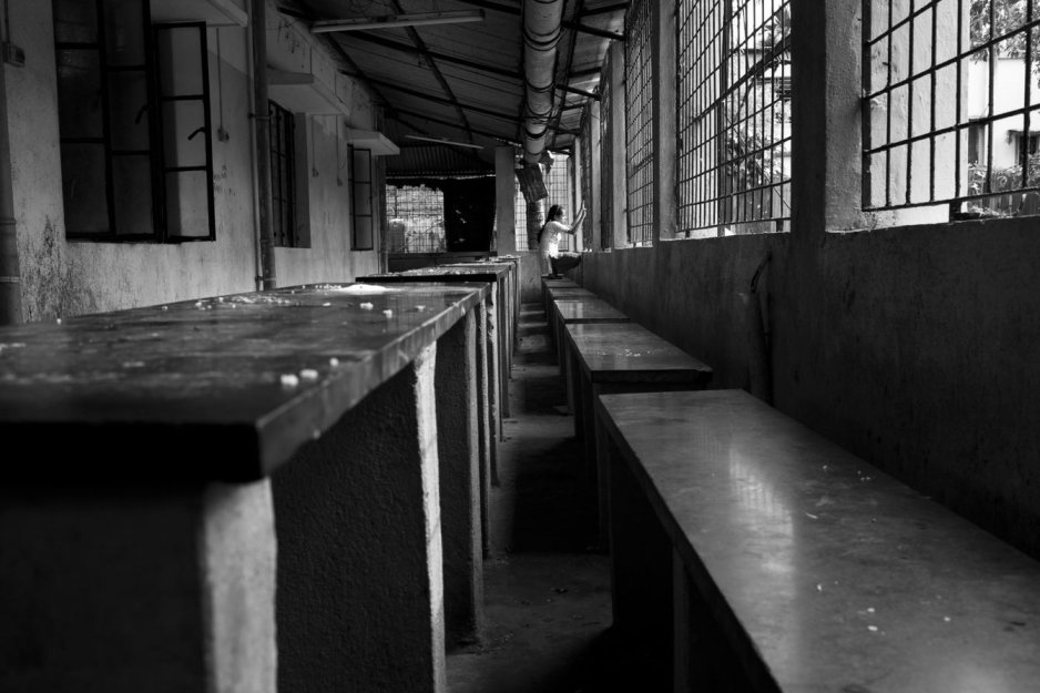 a girl standing in a room looking out of the window-backlash-Picture courtesy: Dasra. Organisations that work to address gender discrimination also face resistance from within the communities. What kind of engagement can help get past it?