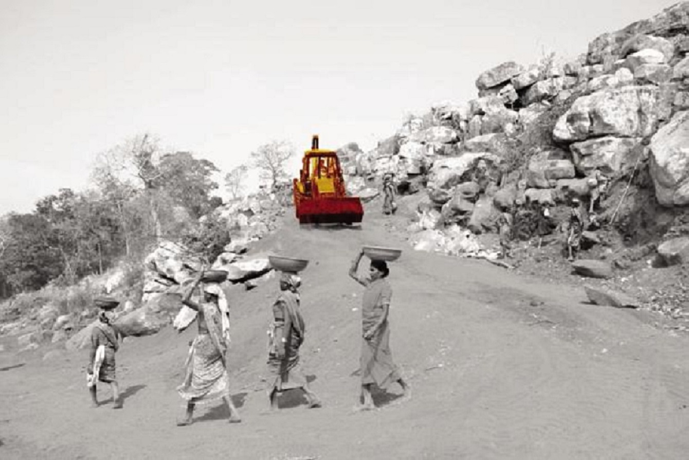 Women NREGA workers walking on a slop-labour payments-picture courtesy-Livemint