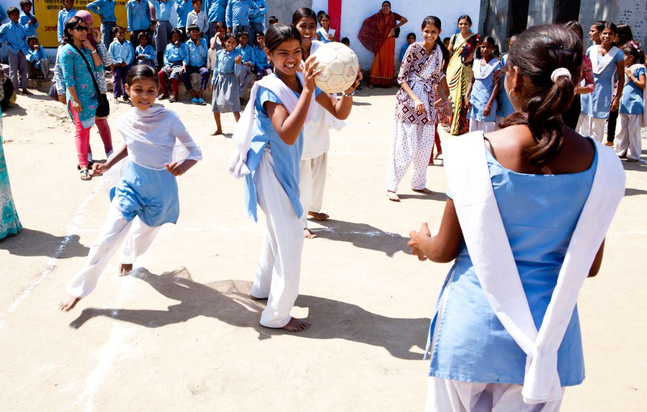 schoolgirls playing ball_CAnderson_menstrual health