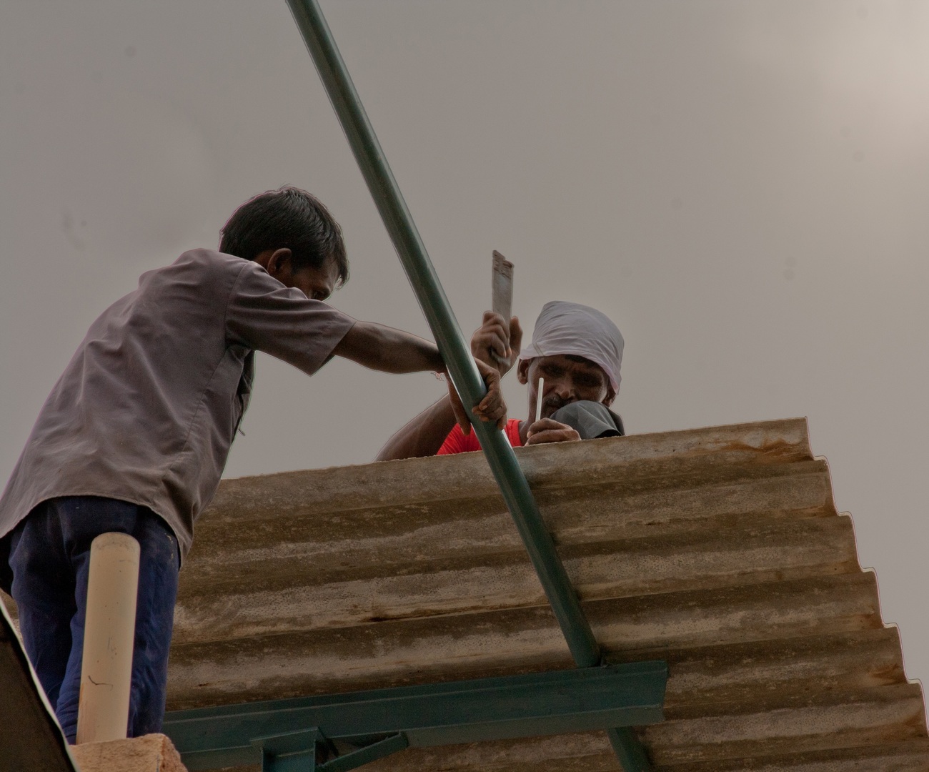 2 people working at a construction site