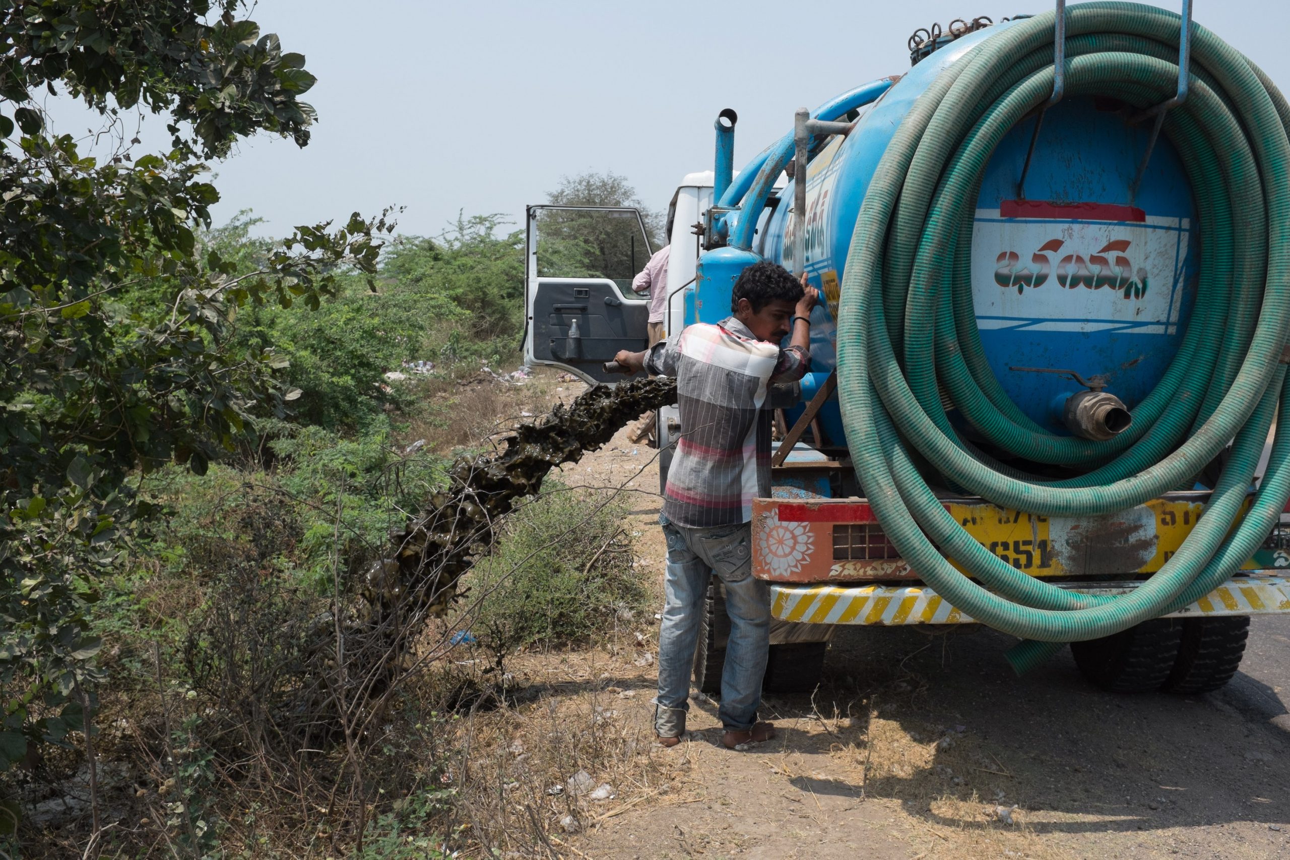 Drain faecal sludge outside city_sanitation workers_epw