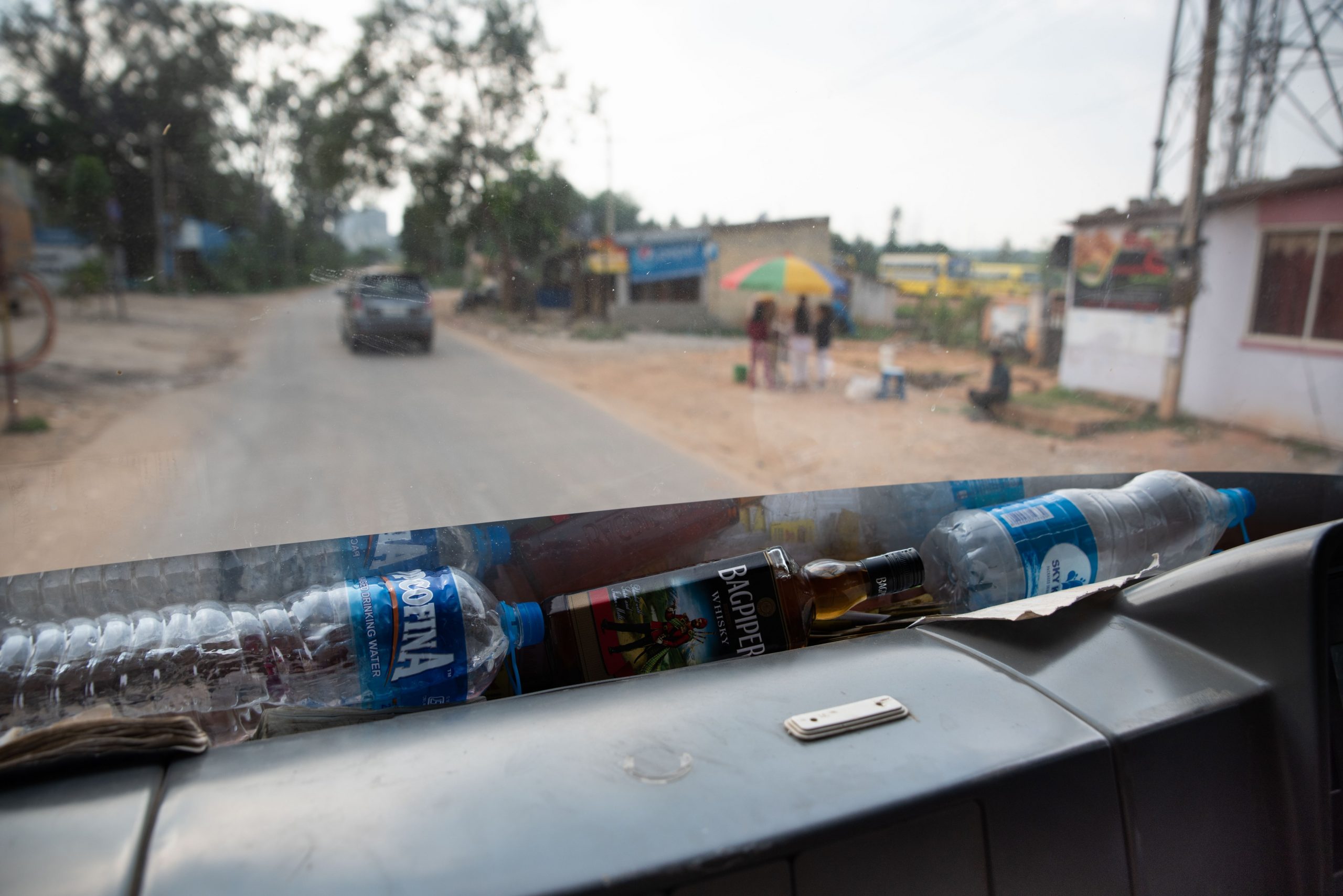 Alcohol on the front of a truck_sanitation workers_epw