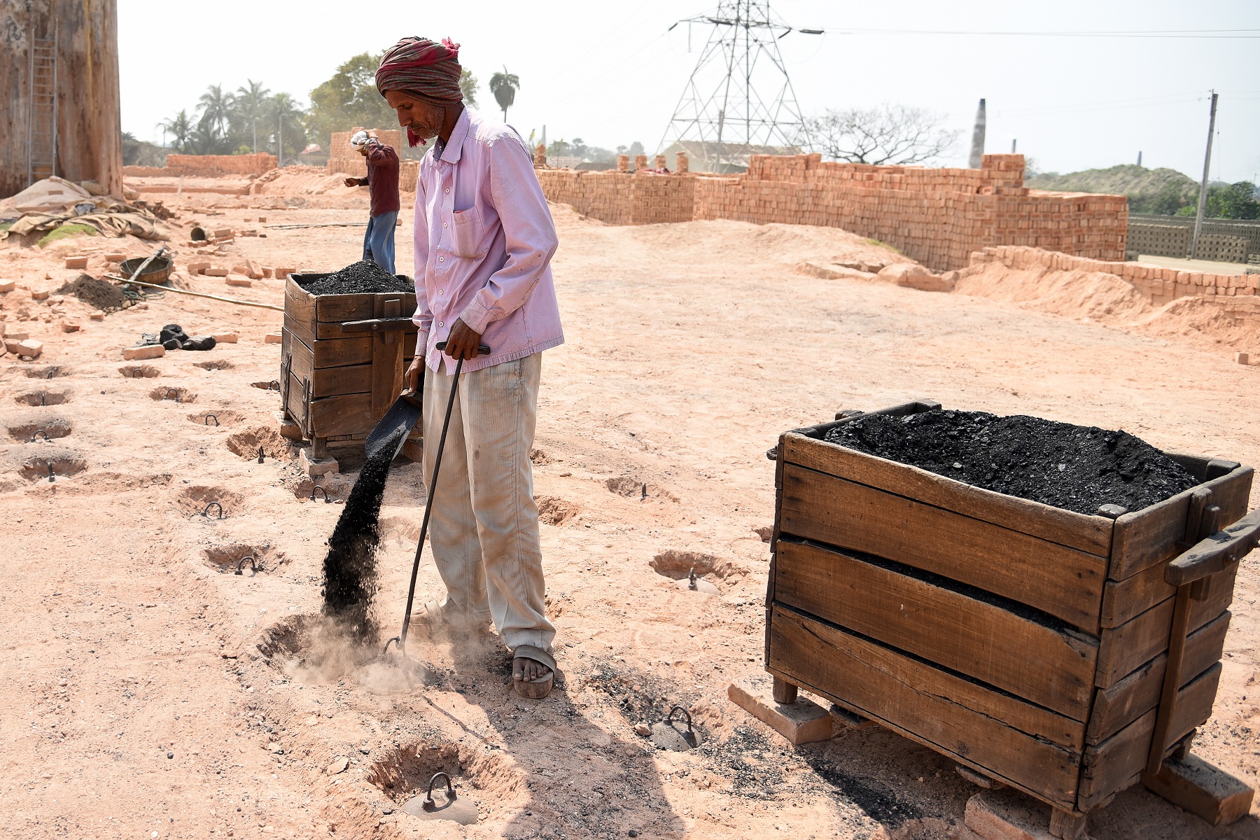 An Indian man with respiratory disease at a brick kiln