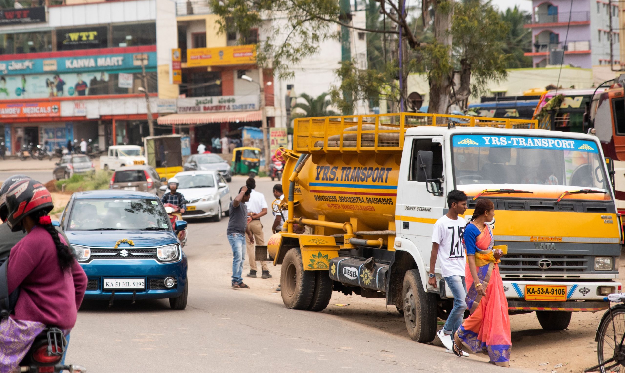 Faecal sludge truck in the city_sanitation workers_epw