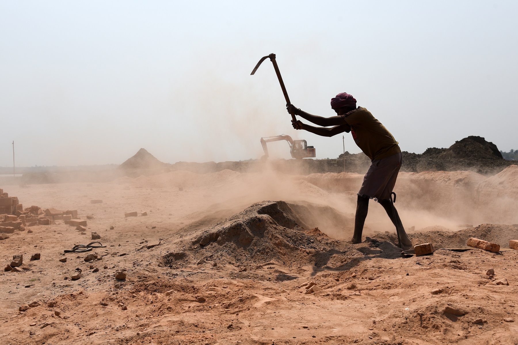 An Indian man labourer at a brick kiln