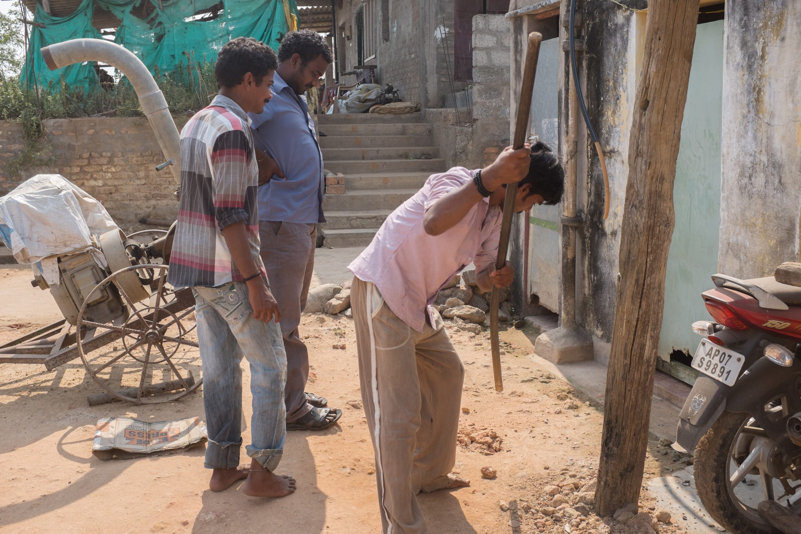 Men digging a sewage pit_sanitation workers_epw