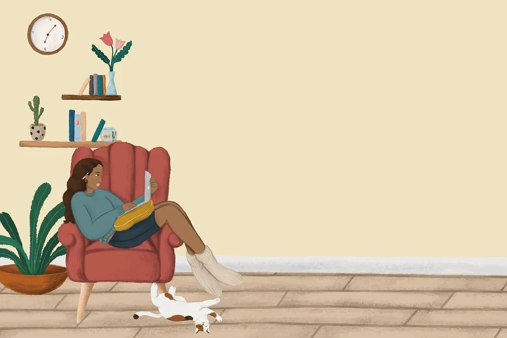 A woman sitting in an armchair, looking at her laptop_graphic_Rawpixel