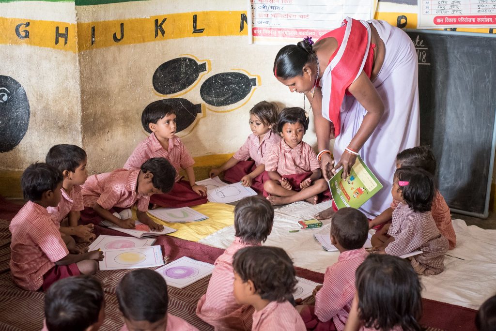 Children colouring in an anganwadi in Patna, India