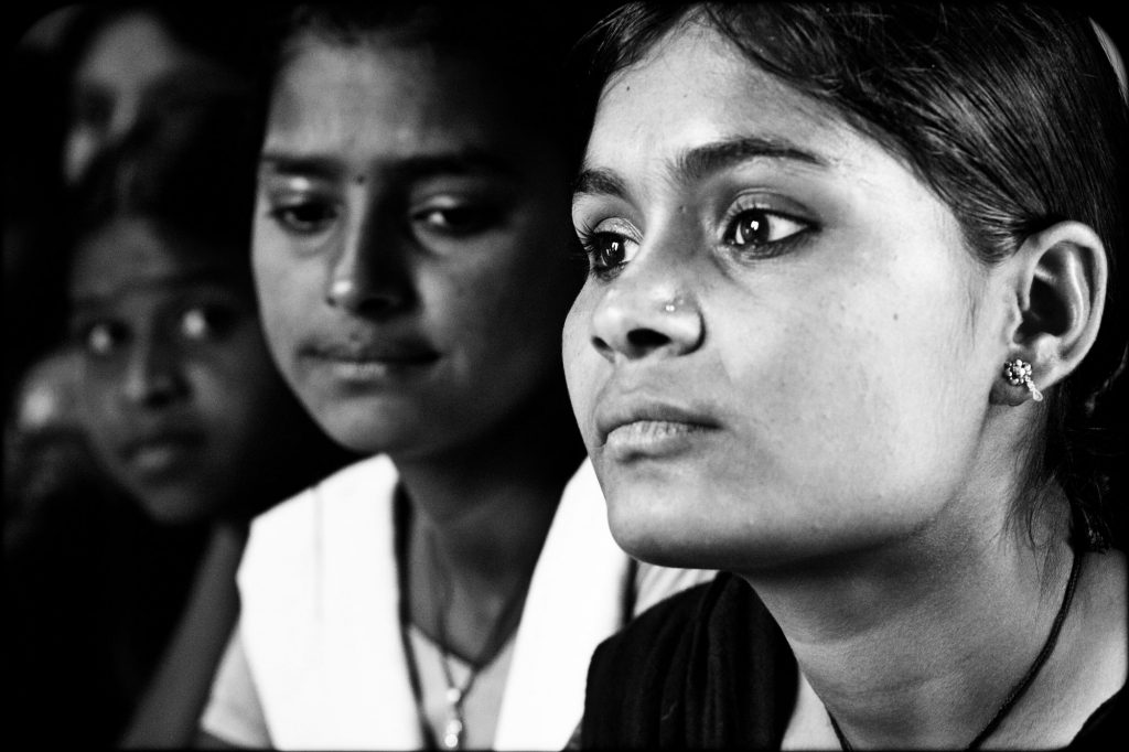 Close up of two Indian women's faces -women and development