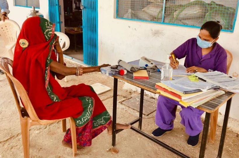 woman getting primary healthcare-COVID-19 frontline workers