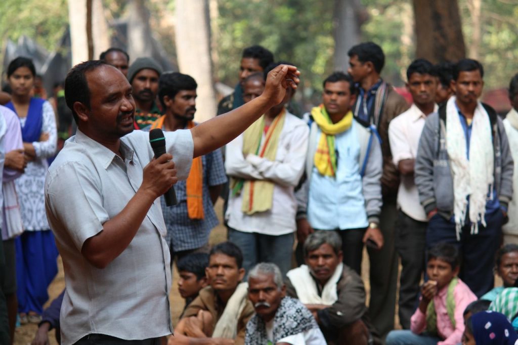 Adivasi lawyer and social activist Lalsu Nogoti giving a speech to his people-adivasi communities-rights