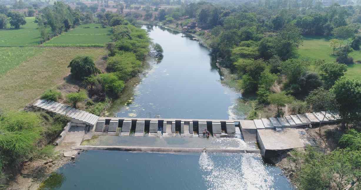 image of a checkdam across a river in Dahod, Gujarat-rural livelihoods