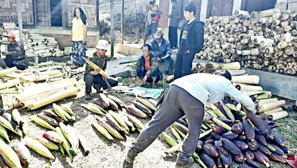 Villagers from Konshakul readying vegetables to be supplied free for villages down hills in Manipur