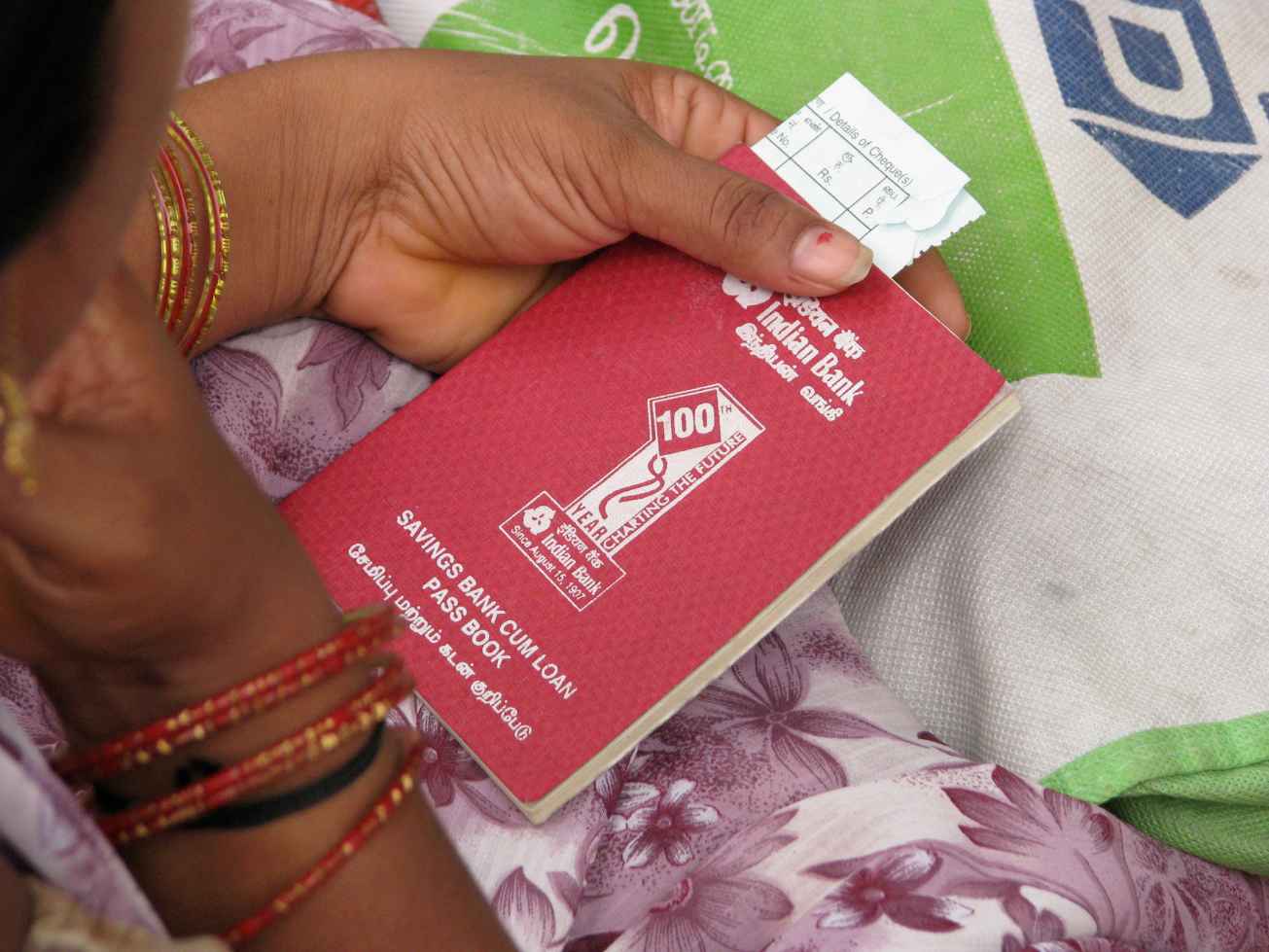 Woman holding a passbook-women's empowerment