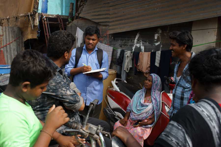 Image 12_A volunteer collecting information from people-water for all-picture courtesy_Suraj Katra