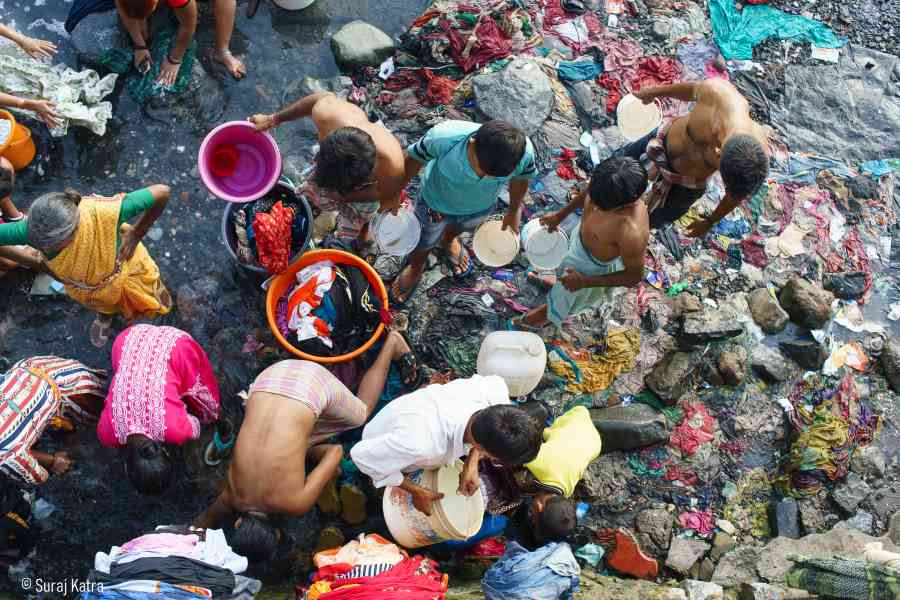 Image 5_people standing on a stream of water washing clothes-water for all-picture courtesy_Suraj Katra