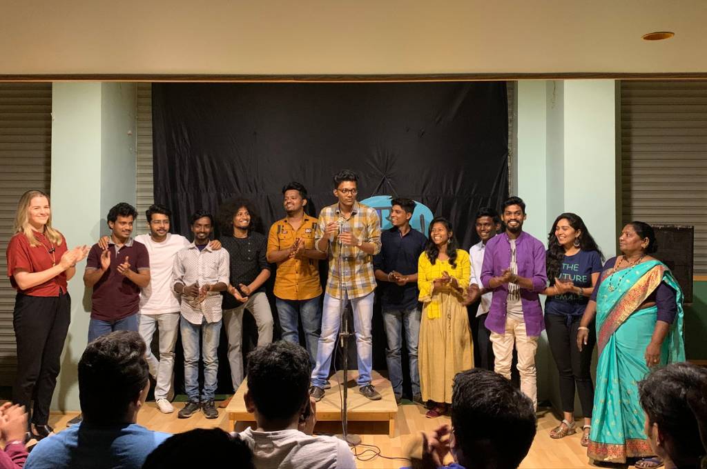 Group of performers of the Marathi comedy show, Kay Boltay, in front of an audience. The group is made up of men and women. Nonprofits often fund arts as drivers of social change, adding predetermined meanings to the performance. This Marathi comedy programme sought to be different.