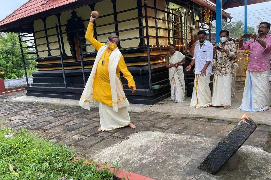 an image of Shashi Tharoor in the act of cracking a coconut while three men and one woman look on-nonprofit humour 2021 memes