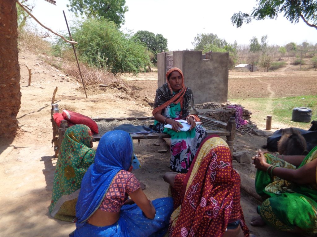 Atiben talking to a group of women-paralegal