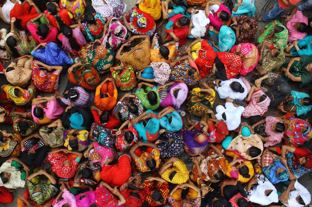 Aerial shot of women protestors sitting_well-being