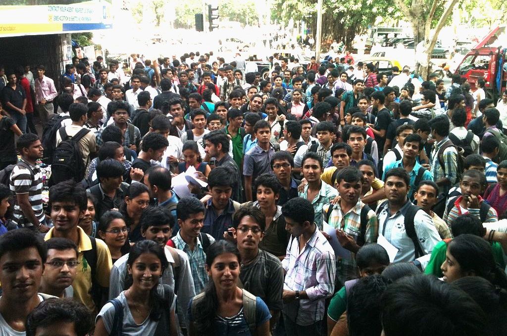 crowd of young people in front of an office-young entrepreneurs