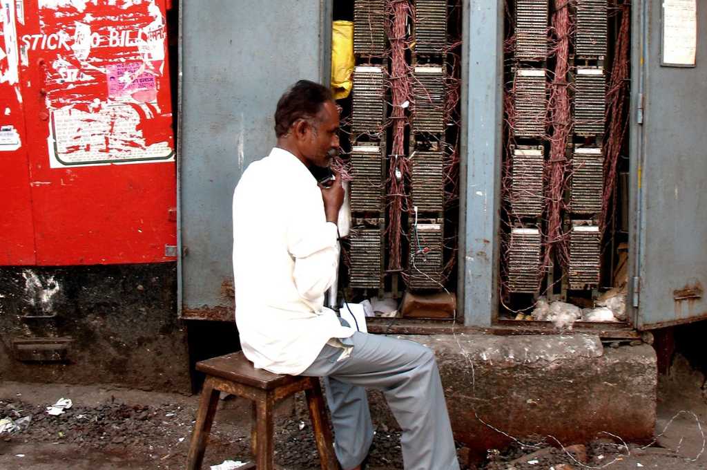 a man operating a switchboard--technology