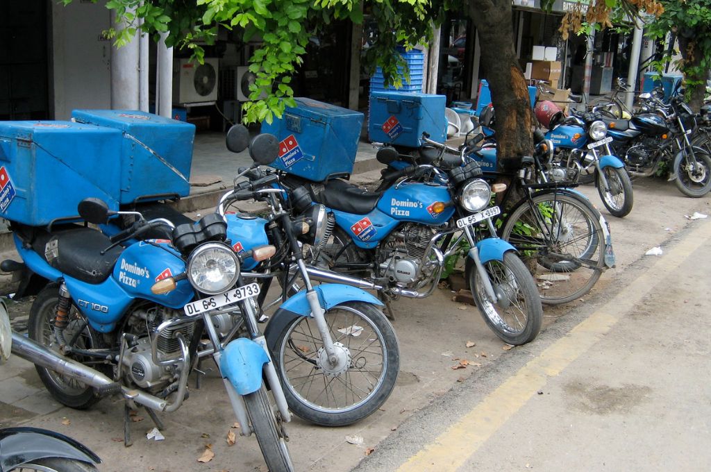blue delivery bikes parked-gig workers