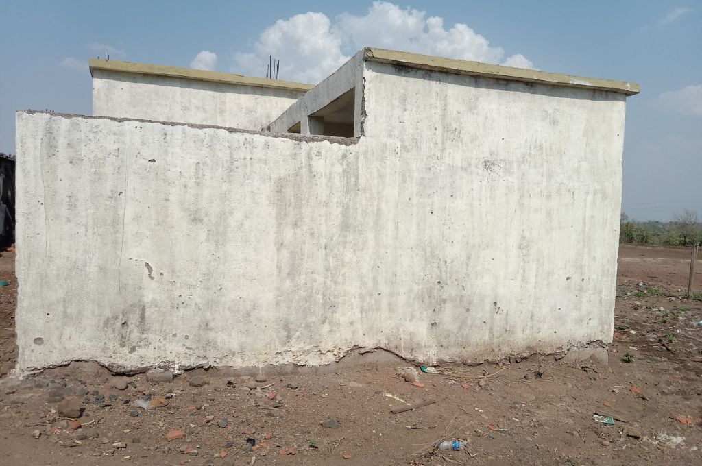 a structure with white walls_kolam tribe