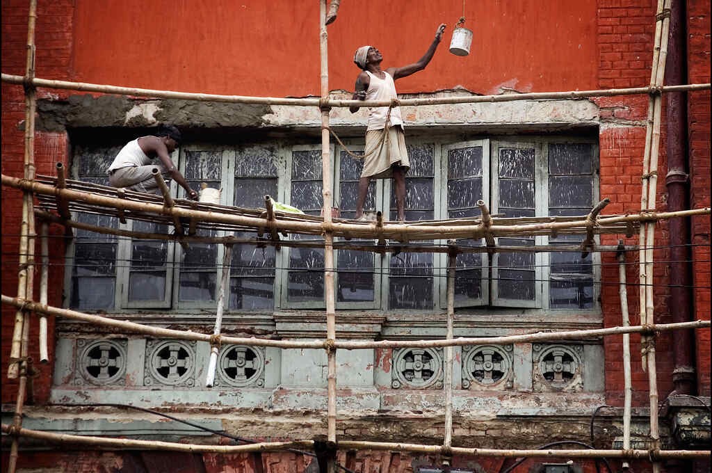 a man working at a construction site--sustainable construction