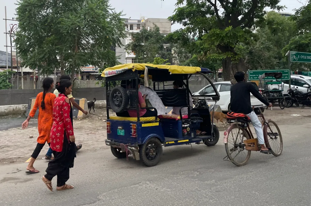 An e-rickshaw on the road in South Delhi