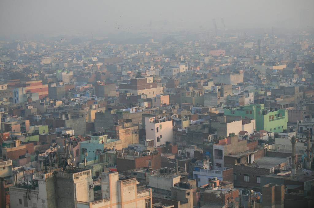 aerial view of city buildings with air pollution_air quality
