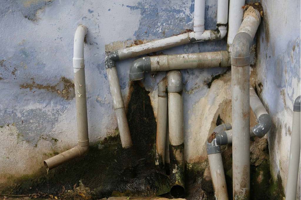 pipes opening into a drain--urban repair