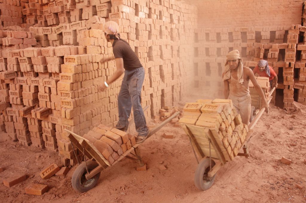 two men wrking in a brick klin_bonded labour