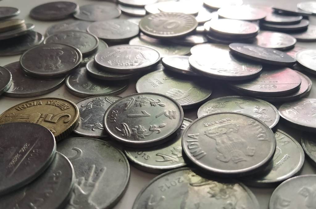 one, two, and five rupee coins--climate finance