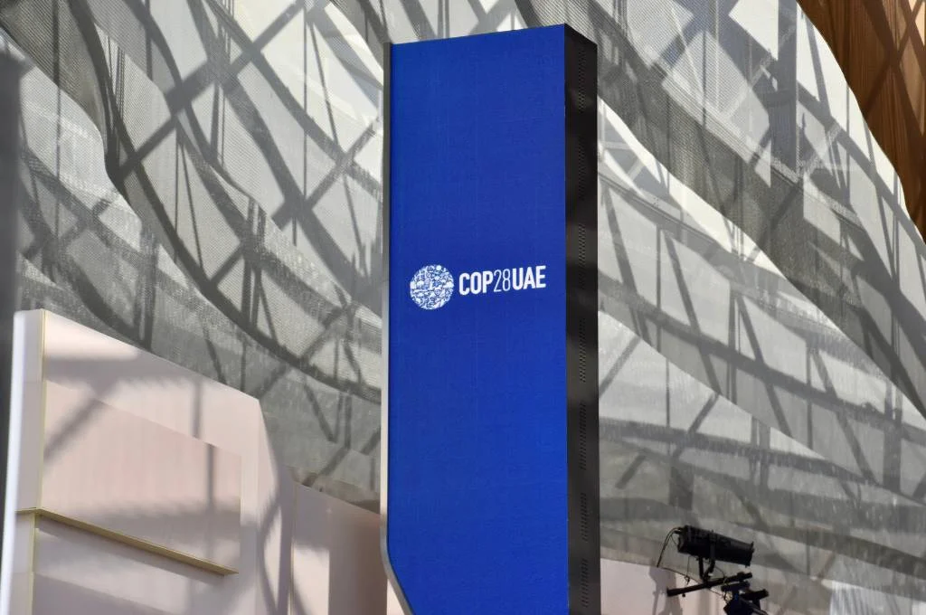 a blue board saying cop28--cop28