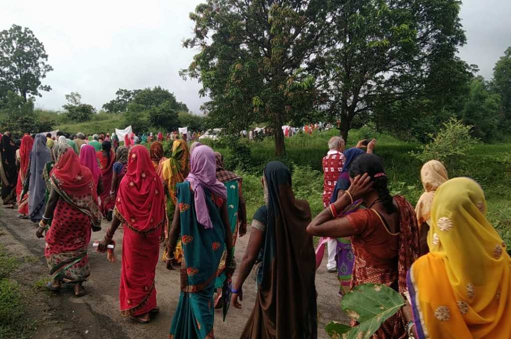 A group of women marching_coal mining