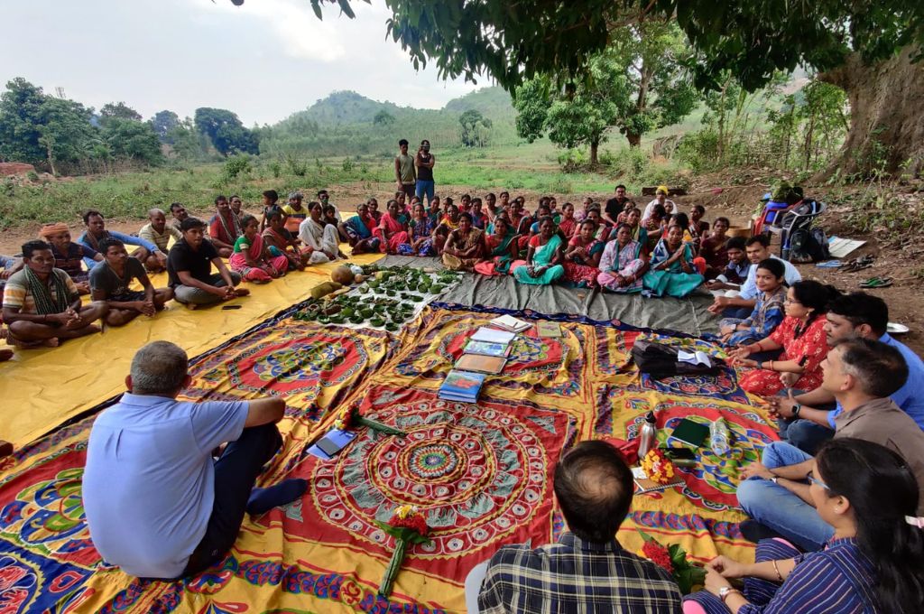 People sitting in a group and talking_social impact