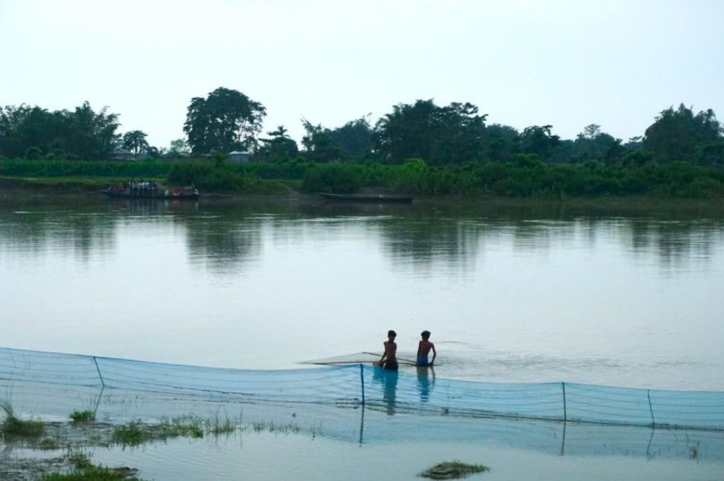 two boys fishing in assam--Life of the Kaibarta fishing community in Assam