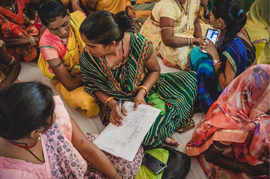 a group of women being surveyed-renewable