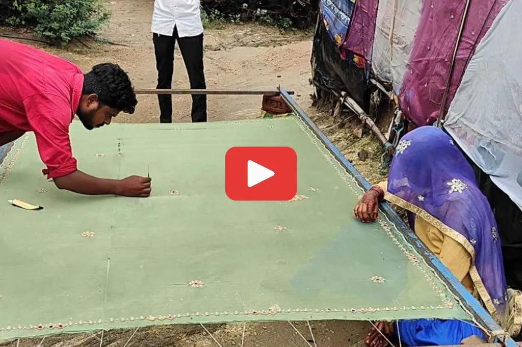 members of rajasthan's kalandar community doing aari-tari embroidery on fabric--livelihoods