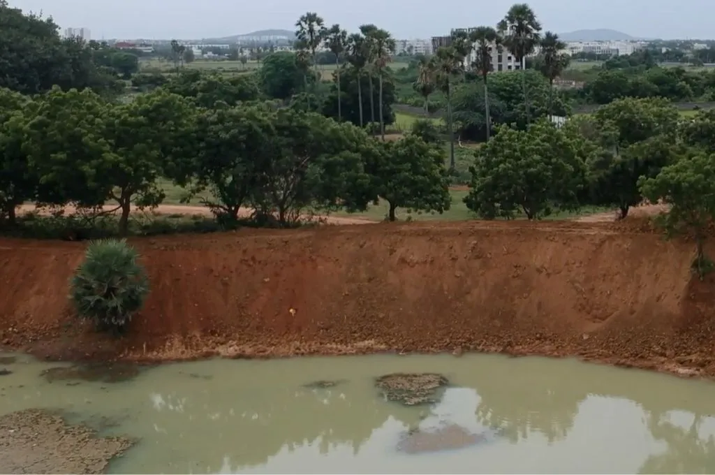 dual embankments, with a mud mound next to water-water bodies